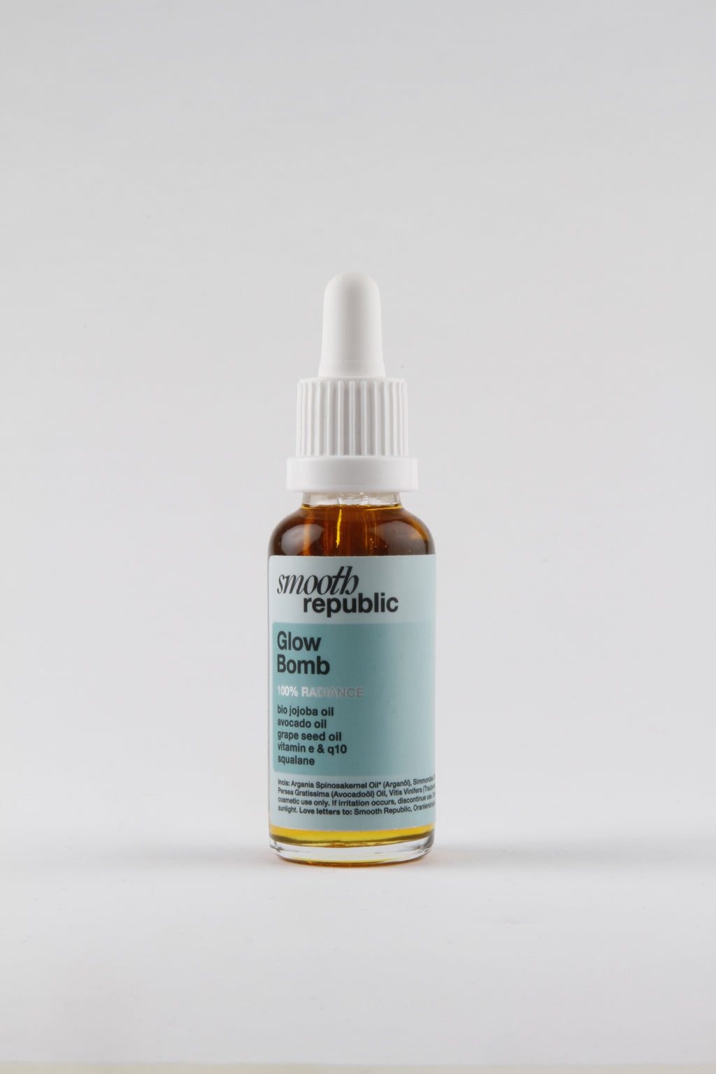 Bottle of skincare product with a label on a white background