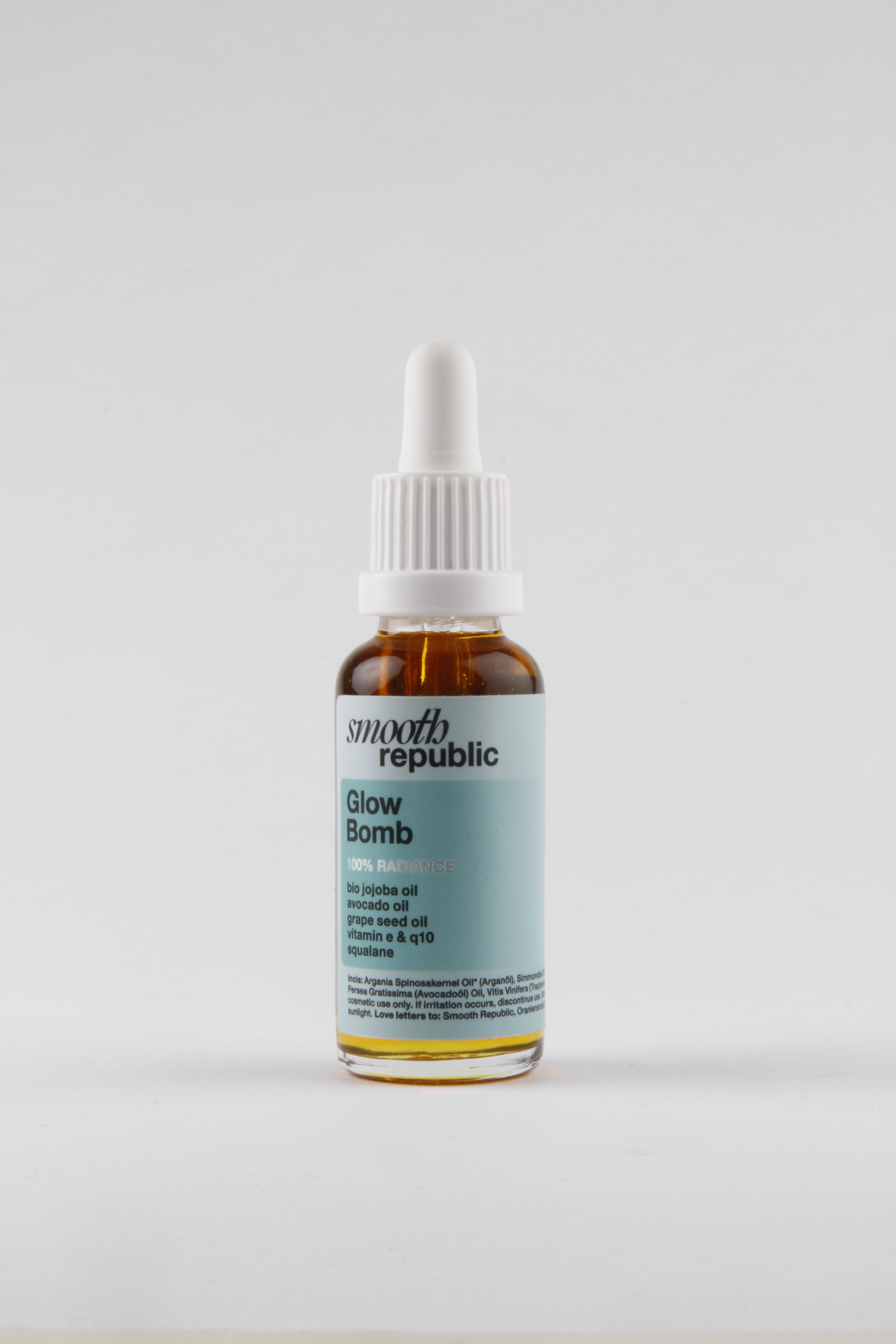 Bottle of skincare product with a label on a white background